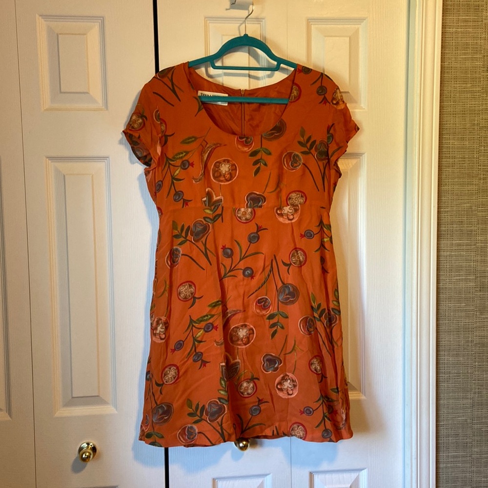 Chiffon dress with orange silky lining